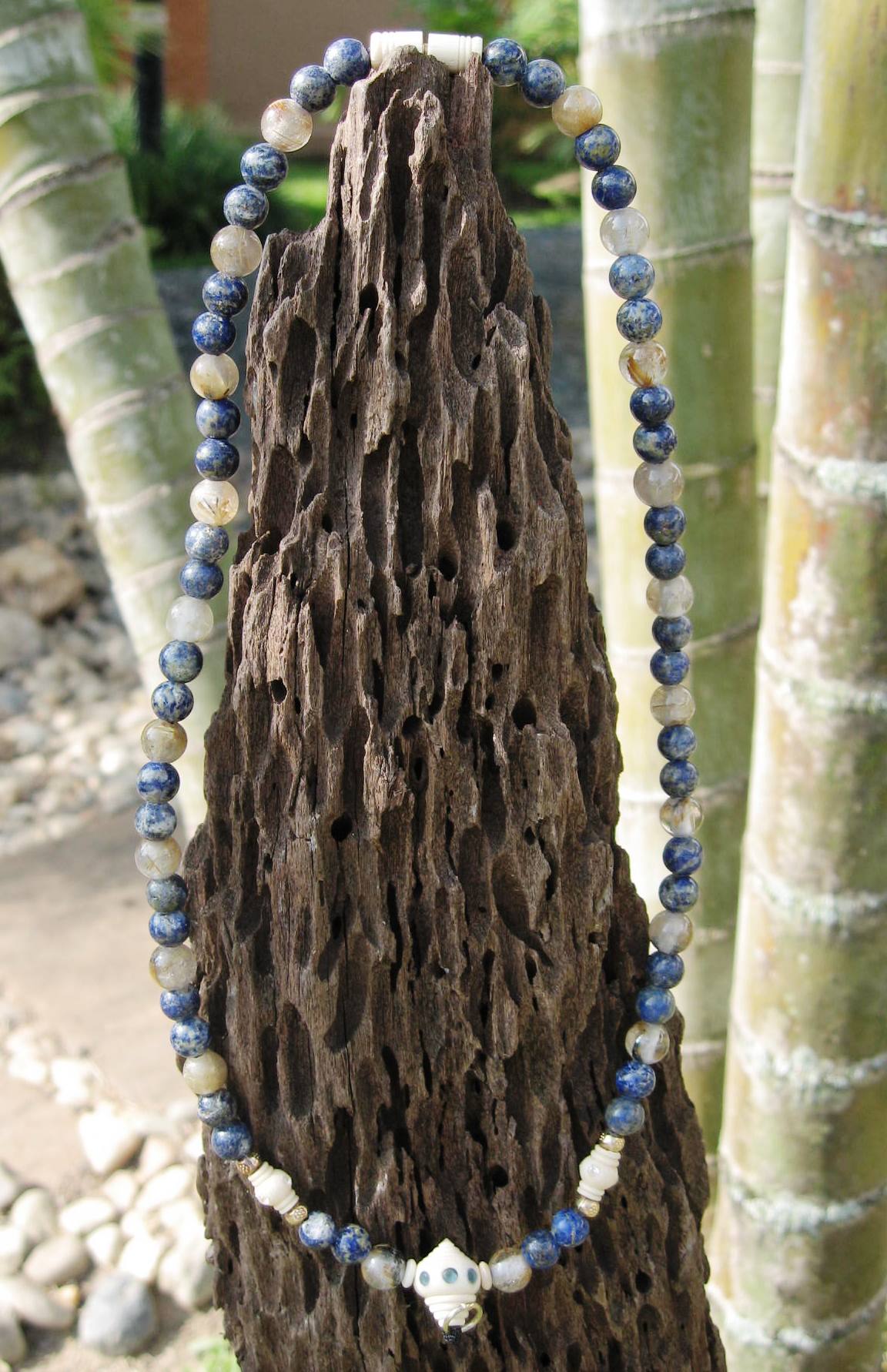 Lapis stone with ivory amulet chain