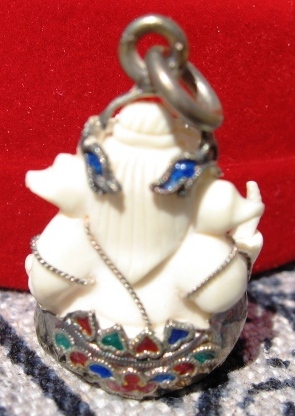 ganesha amulet with enameled silver accent
