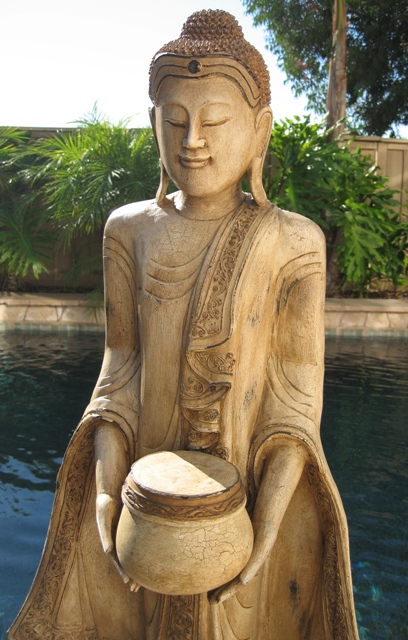 Thai Standing Buddha with begging bowl