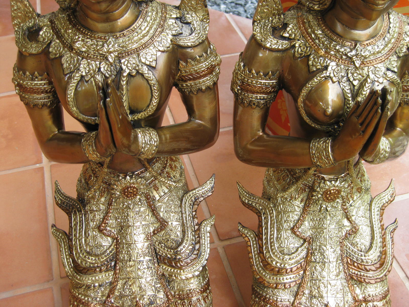 Pair of Male & Female Kneeling Teppanom in polished brass