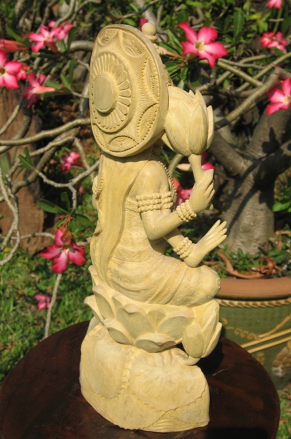 hand carved laksmi statue from bali