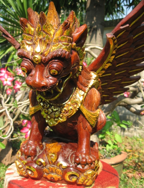 hand carved garuda in gold from bali