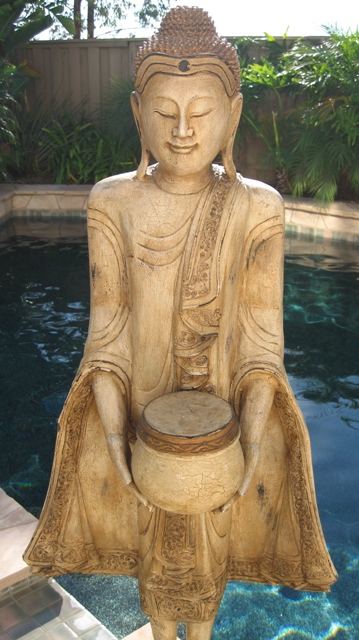 Thai Standing Buddha with begging bowl