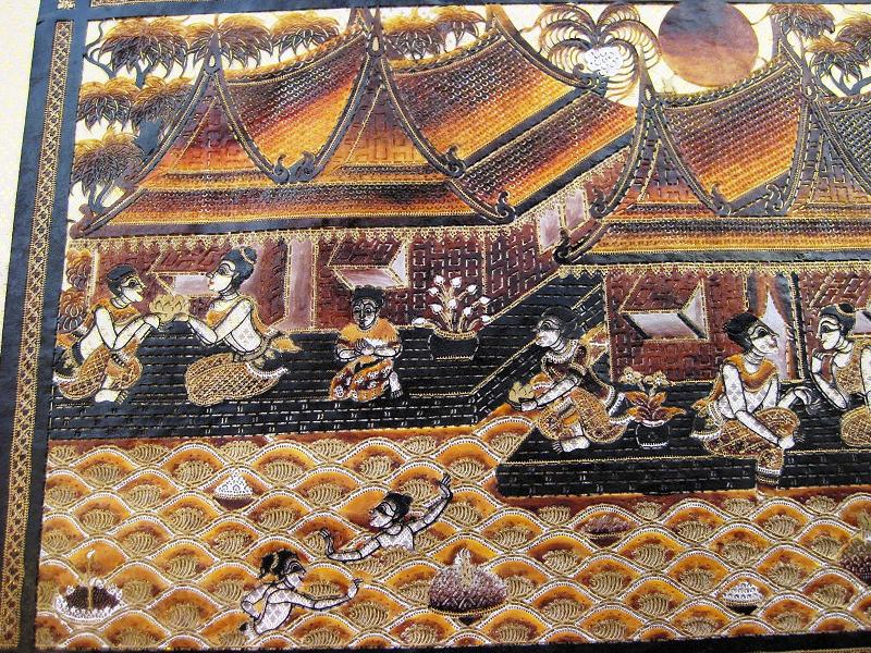 Hand Carved Ta-Lung Leather in Village Scene